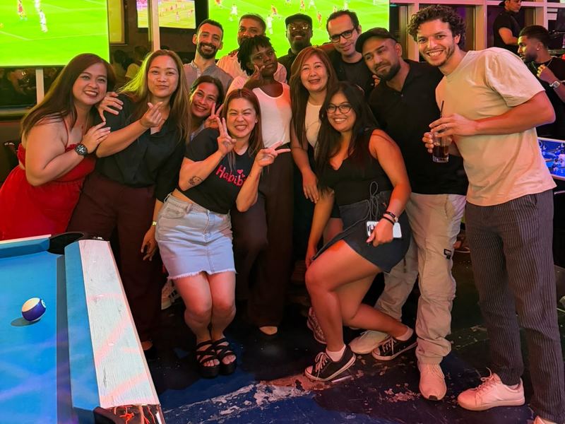 United Expats in UAE members watching a football match together